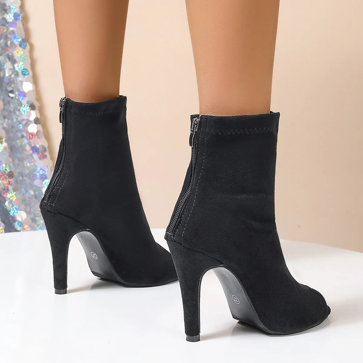 Women's black PU chunky heel peep toe Martin boots with buckle fastening, side view