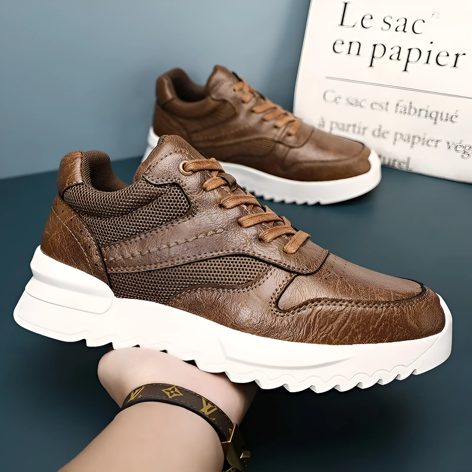 Men's black invisible wedge hidden heel casual sports shoes with synthetic leather upper and rubber sole, side view
