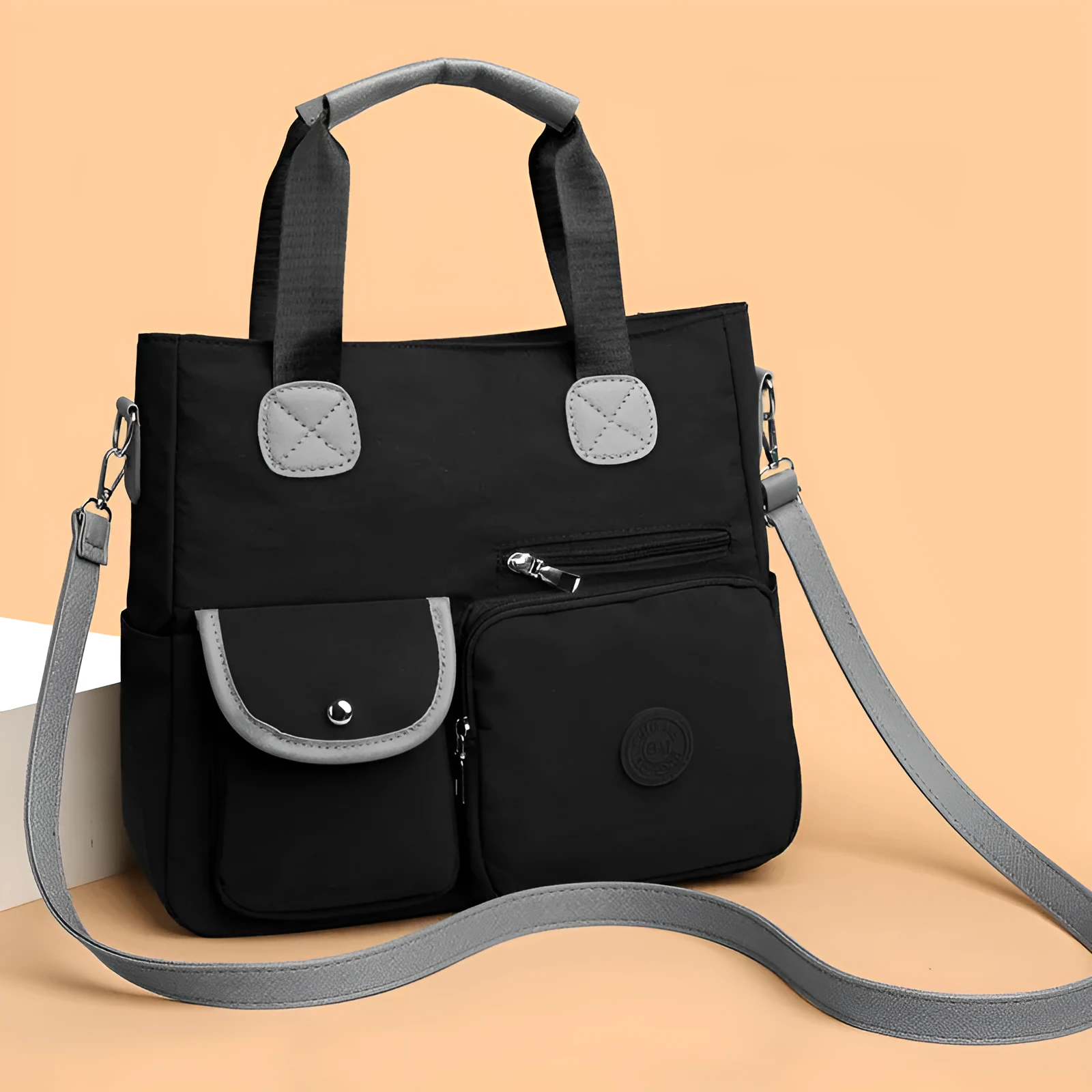 Women's nylon large-capacity crossbody bag in black with organised compartments and single shoulder strap
