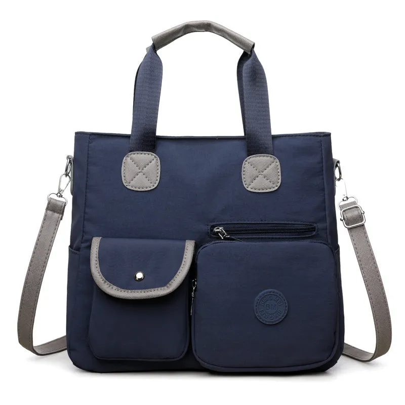 Women's nylon large-capacity crossbody bag in black with organised compartments and single shoulder strap