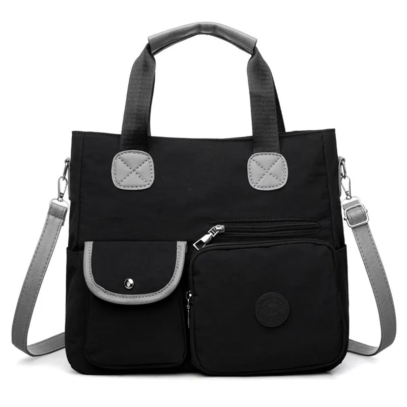 Women's nylon large-capacity crossbody bag in black with organised compartments and single shoulder strap