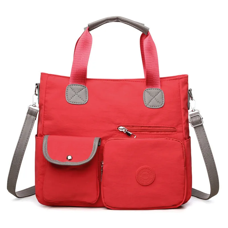 Women's nylon large-capacity crossbody bag in black with organised compartments and single shoulder strap