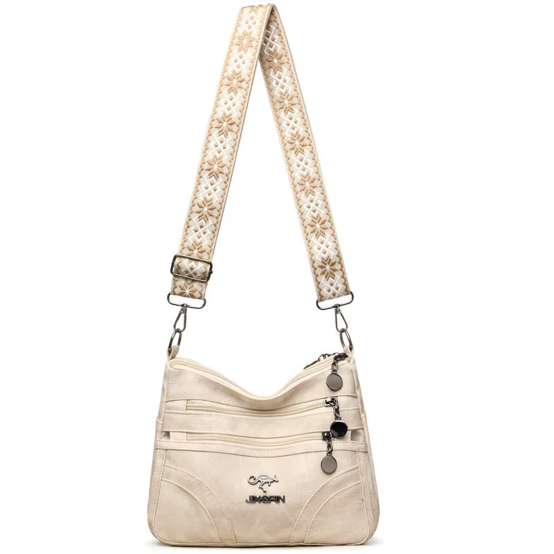 One-shoulder soft leather tote bag in brown with contrast colour details, horizontal square shape