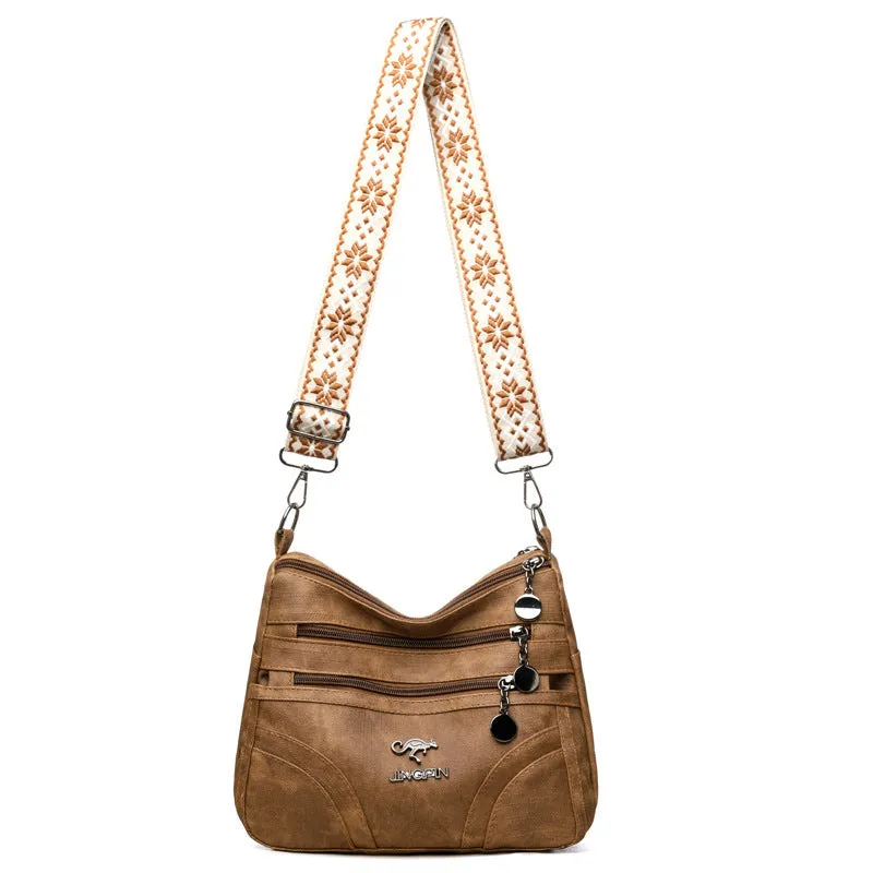 One-shoulder soft leather tote bag in brown with contrast colour details, horizontal square shape