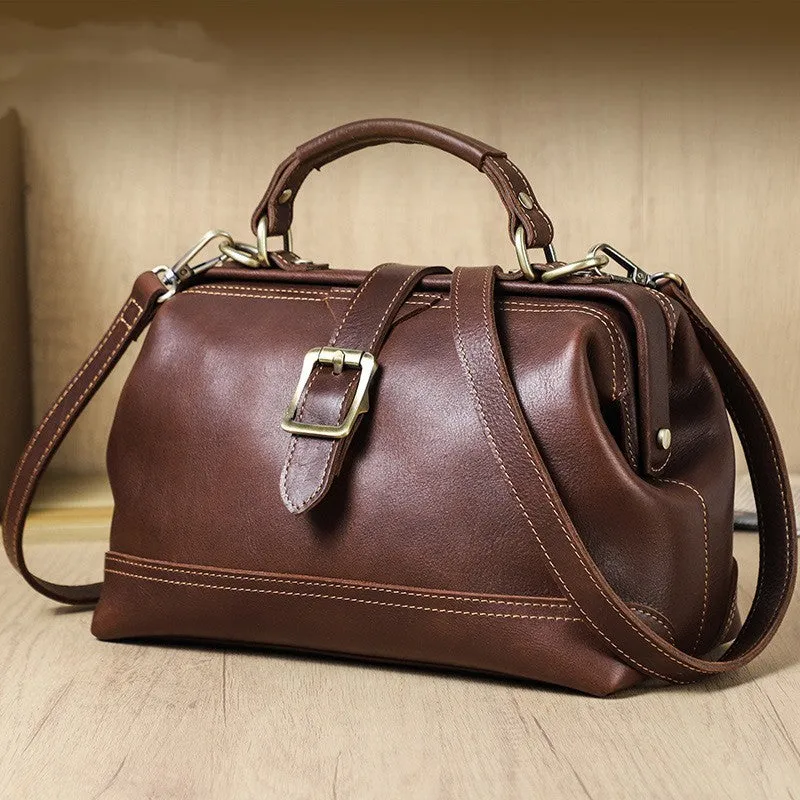 Reddish brown genuine leather women's shoulder messenger bag with sewing line details and crossbody strap
