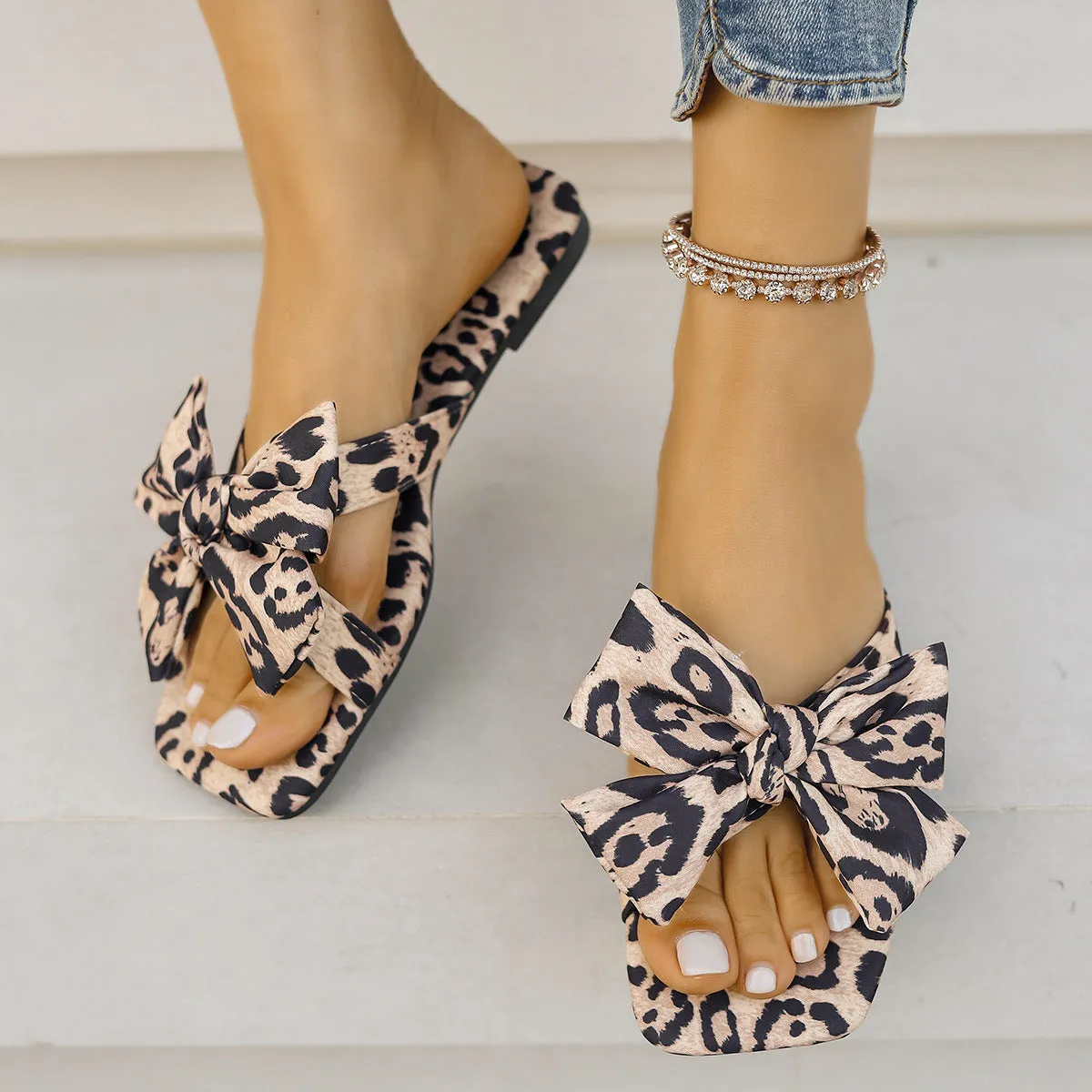 Women's leopard print square toe sandals with bow detail on cloth cover upper, rubber sole, in European American style.