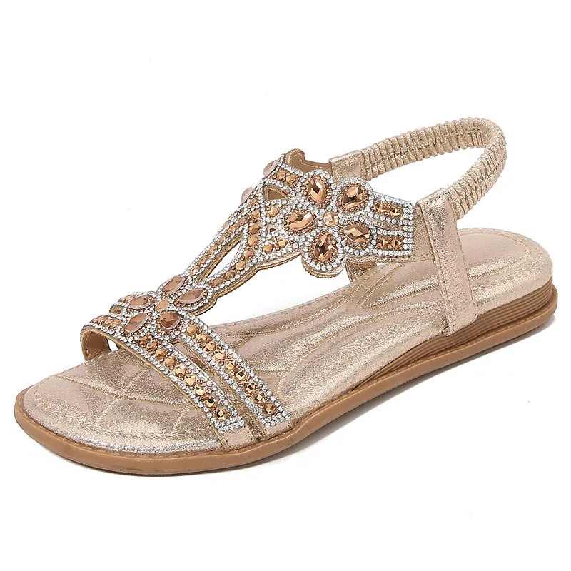 Women's flat sandals with bohemian flower and rhinestone decoration on PU upper, round toe, available in multiple colours