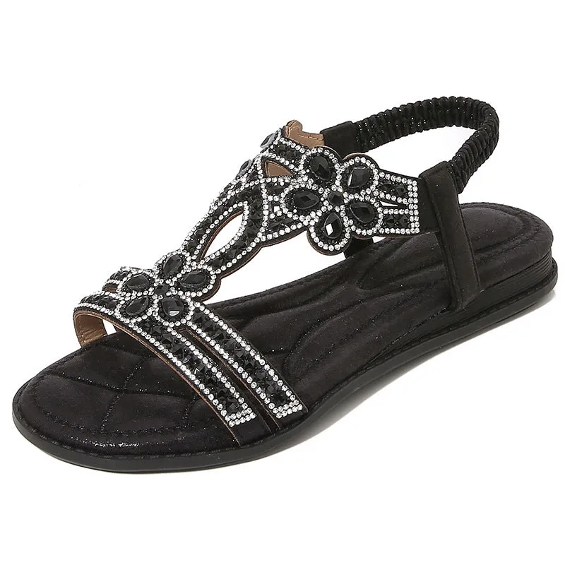 Women's flat sandals with bohemian flower and rhinestone decoration on PU upper, round toe, available in multiple colours