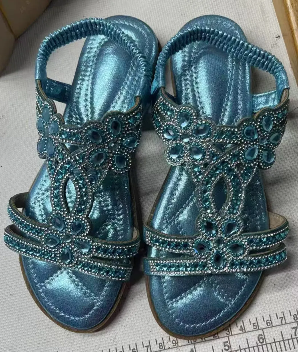Women's flat sandals with bohemian flower and rhinestone decoration on PU upper, round toe, available in multiple colours