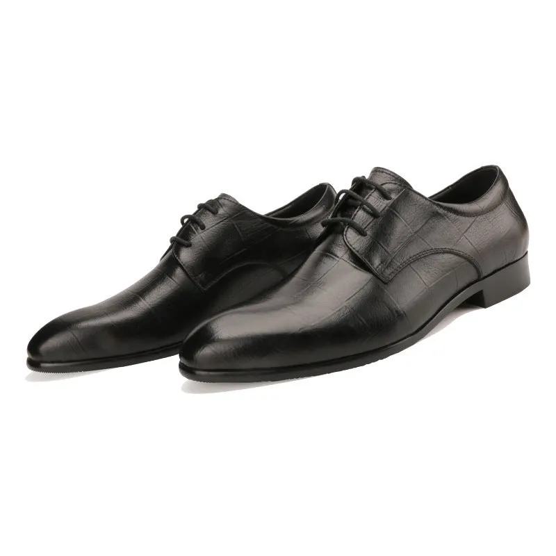Men's black checkered leather derby shoes with a pointed toe and rubber sole.