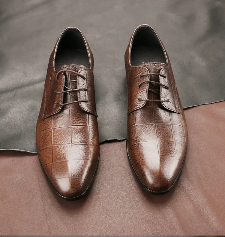 Men's black checkered leather derby shoes with a pointed toe and rubber sole.