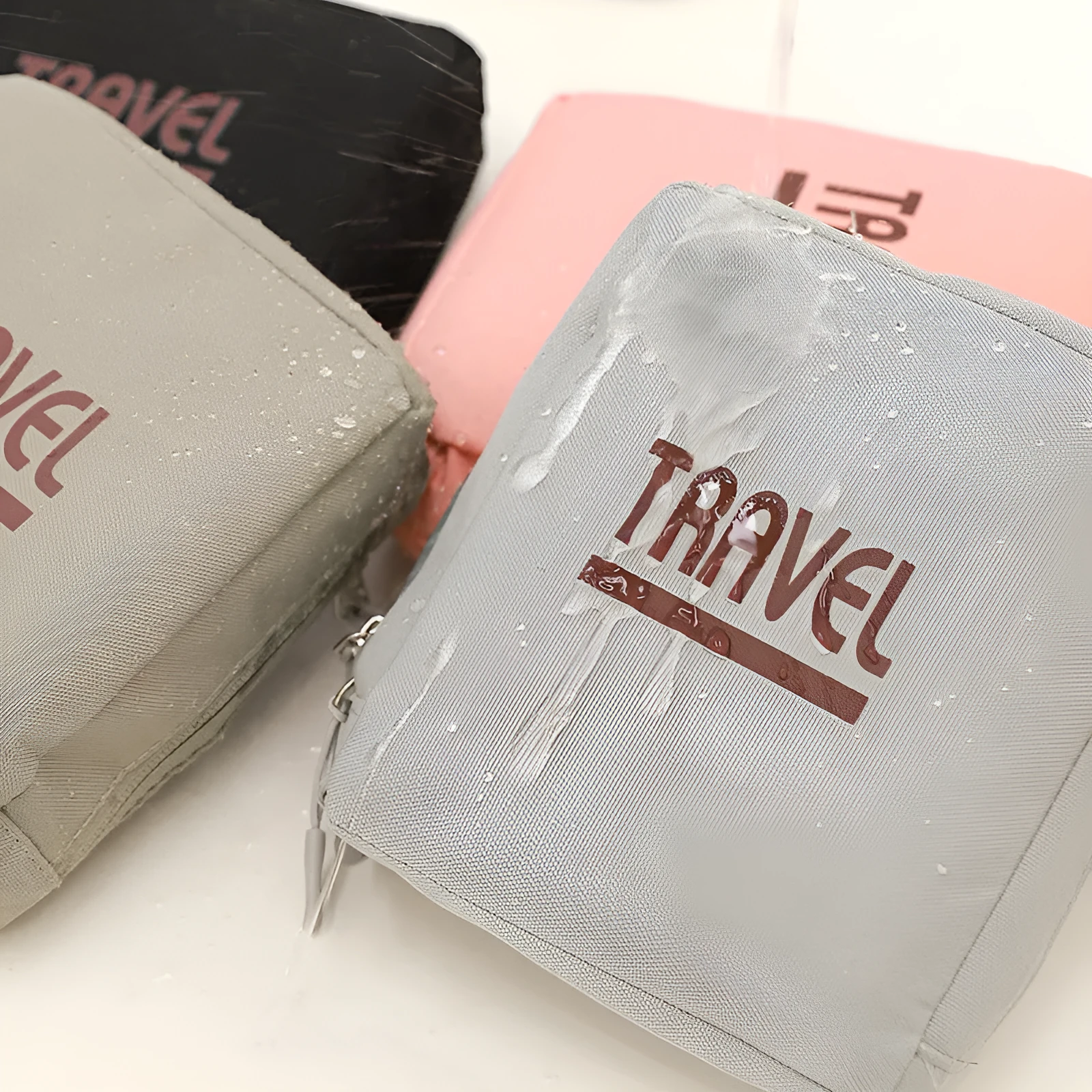 Cube-shaped travel storage bag in 300D Oxford cloth available in black, grey, khaki, pink