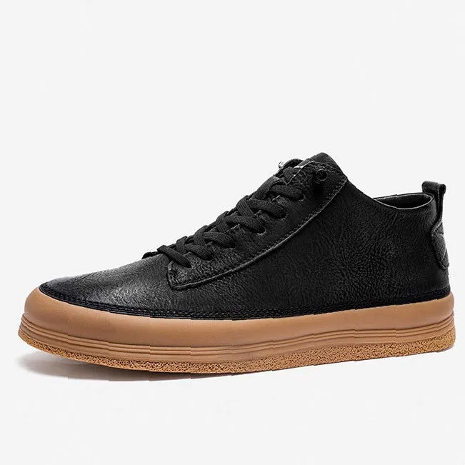 Men's black and white casual leather shoes with round toe and flat rubber sole.