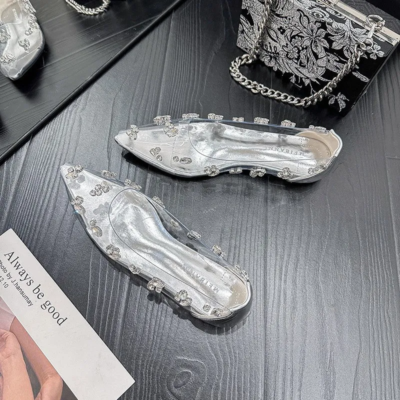 Silver transparent PVC stiletto pumps with rhinestone embellishments and buckle fastening