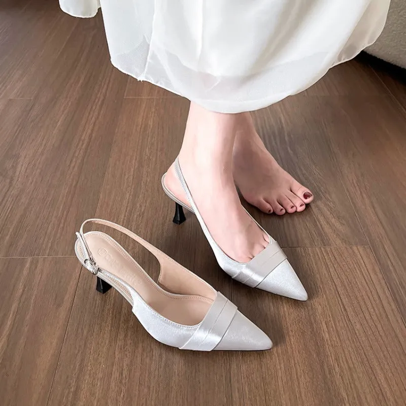 Women's stiletto heel pointed toe closed sandals with wedge heel in black, side view