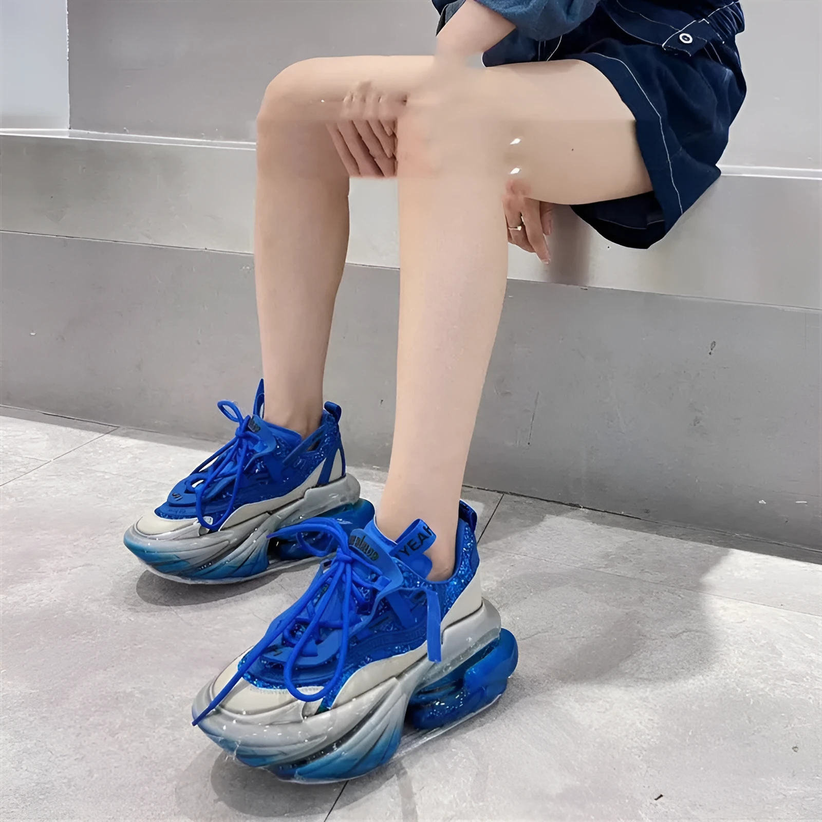 Women's leather casual sports shoes with a thick jelly sole and cross-tie design in multiple colours.