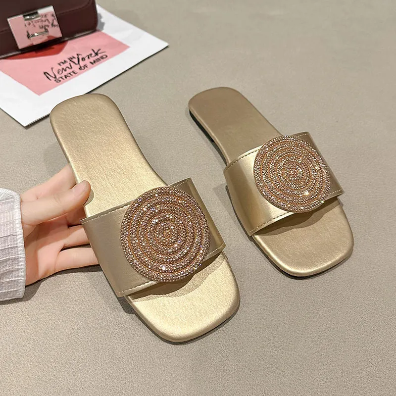 Open toe PU slippers with rhinestone decoration, available in black, white, and gold colours, sizes 36 to 43