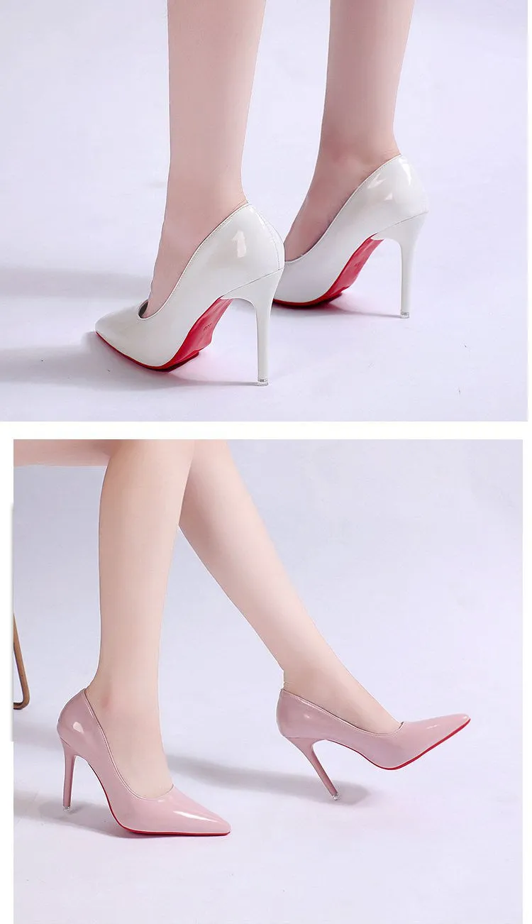 Women's black stiletto heel pump with pointed toe and shallow mouth design on a white background.