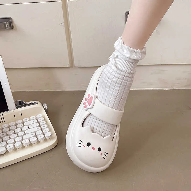 Cartoon closed-toe EVA slippers in white with thick non-slip sole