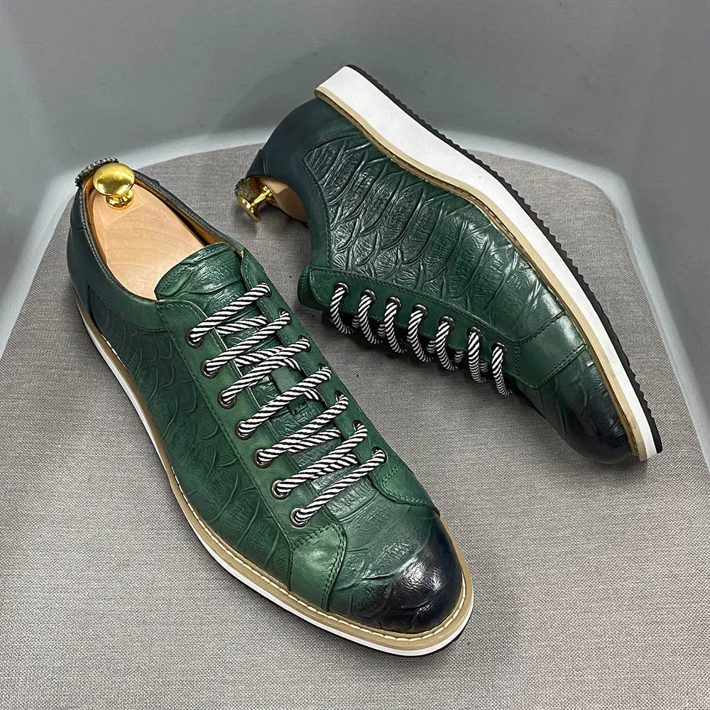 Men's white low-top lace-up shoes with an embossed patterned upper, shown on a plain background.
