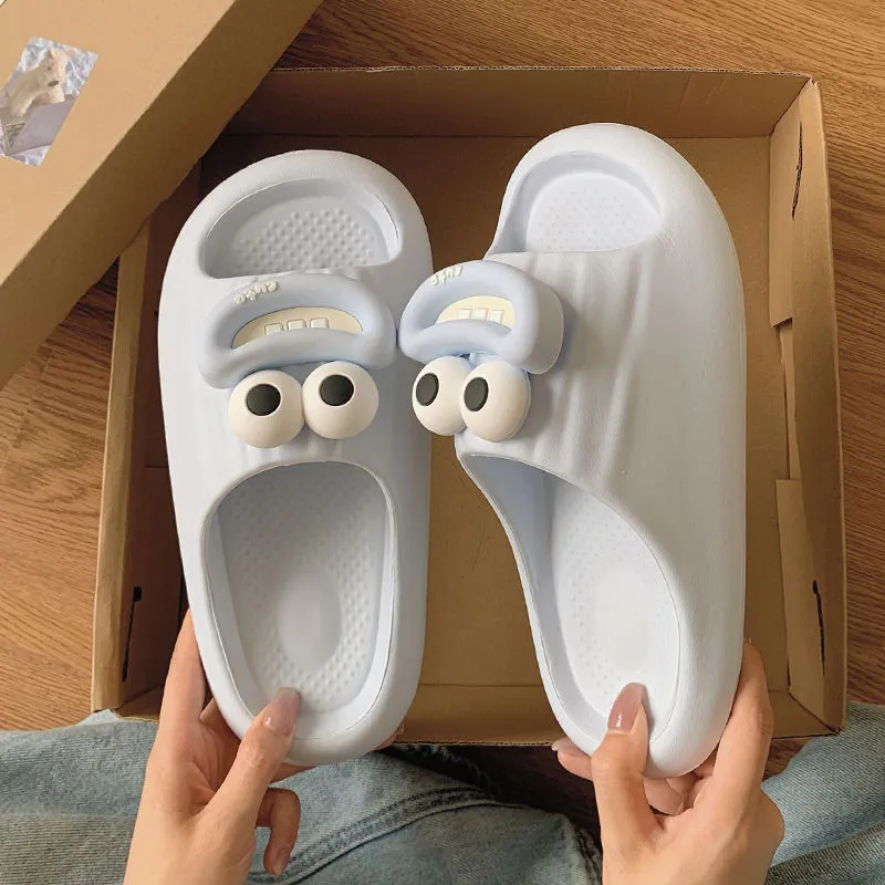 Sausage mouth slippers in light blue with soft EVA sole on wooden floor, indoor household use