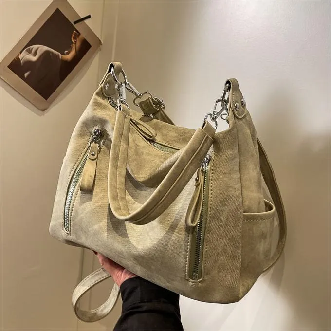 Large capacity women's casual shoulder bag in PU with sewing thread detail, available in denim blue, khaki, dark brown, light blue