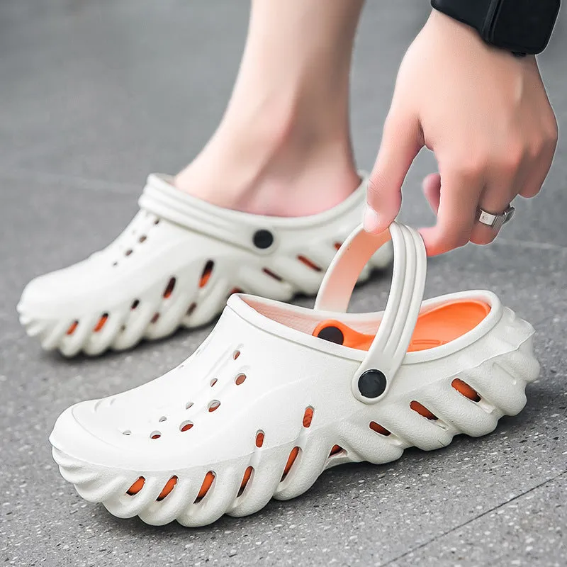 Men's beige EVA slipper sandals with hollow out design and round toe on a plain background.