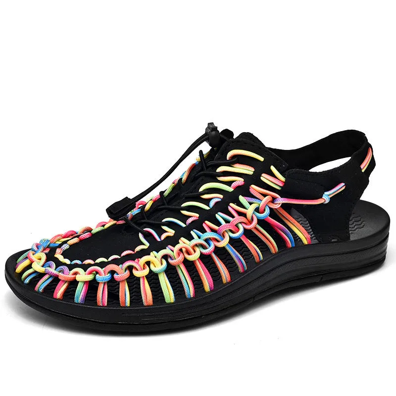 Woven Roman-style sandals with elastic drawstrings in rainbow colour on a rubber sole.
