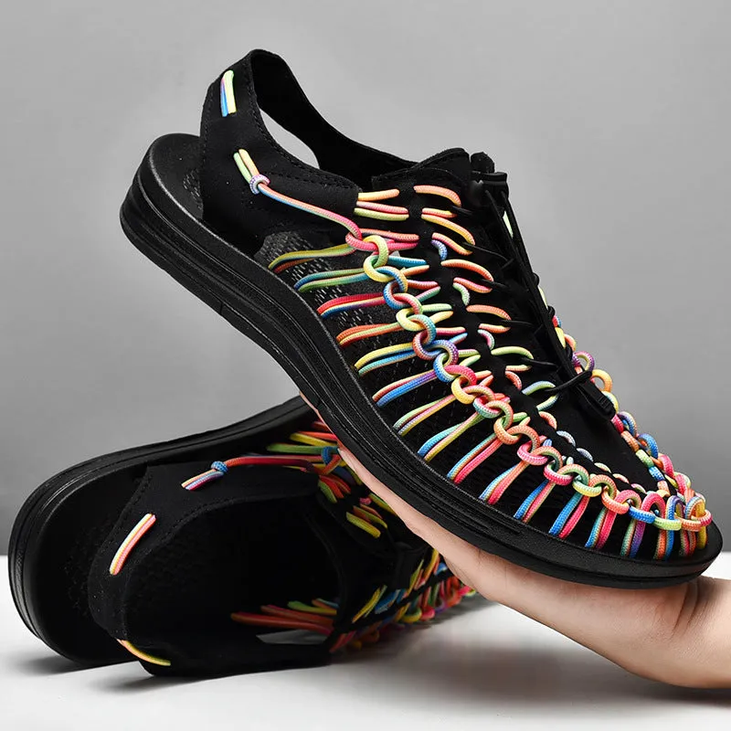 Woven Roman-style sandals with elastic drawstrings in rainbow colour on a rubber sole.