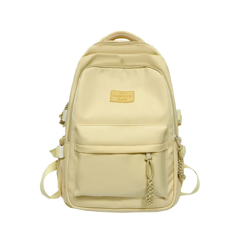 Korean-style lightweight waterproof nylon backpack for primary school students in macaron colour with curved shoulder strap, 20-35L capacity
