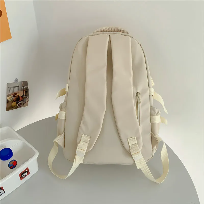 Korean-style lightweight waterproof nylon backpack for primary school students in macaron colour with curved shoulder strap, 20-35L capacity