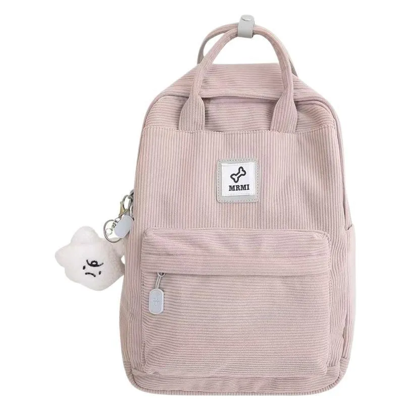 Retro hand-carrying backpack in light pink with breathable fabric, document pocket, and sewing line details for school use.