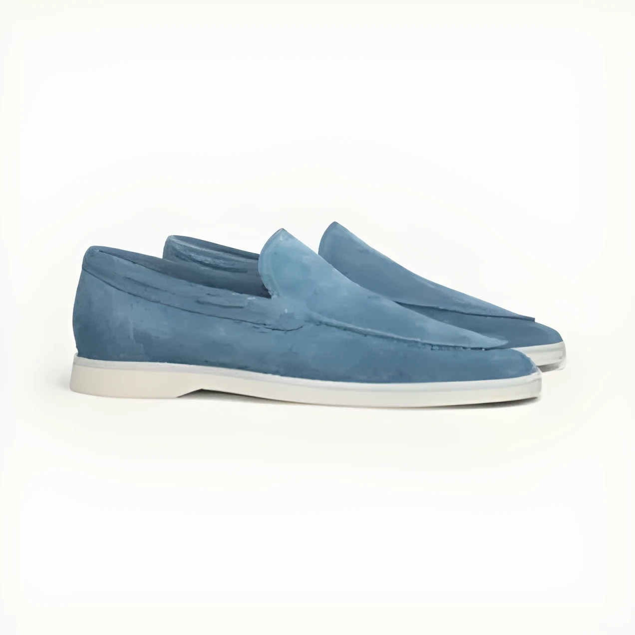 Men's matte suede flat shoes in sky blue with round toe and rubber sole on a plain background