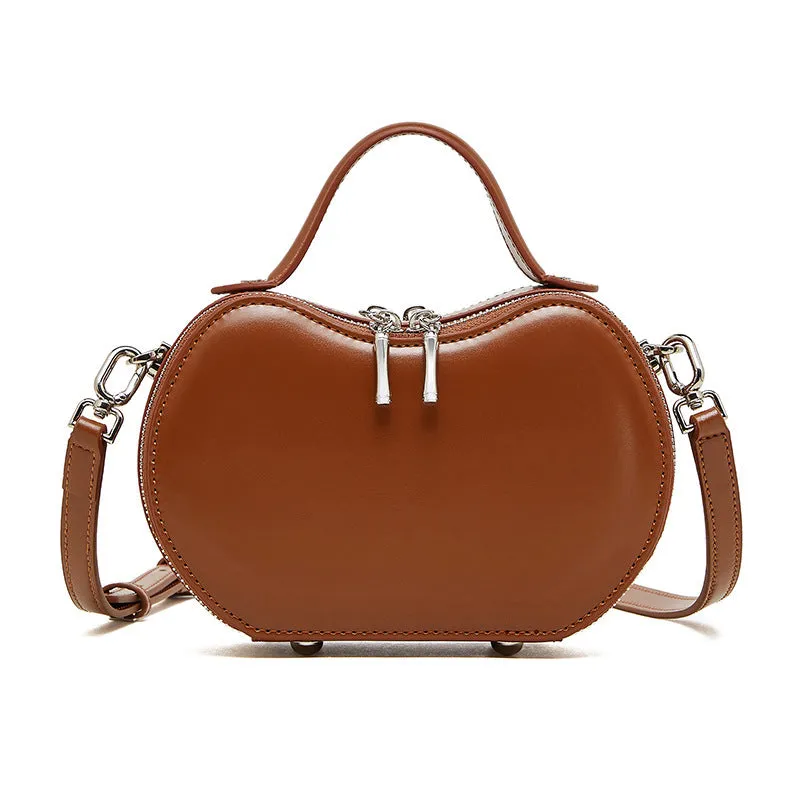 Creative fruit leather heart shape cowhide messenger bag in light brown with single shoulder strap