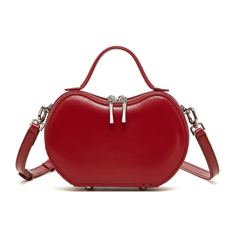 Creative fruit leather heart shape cowhide messenger bag in light brown with single shoulder strap