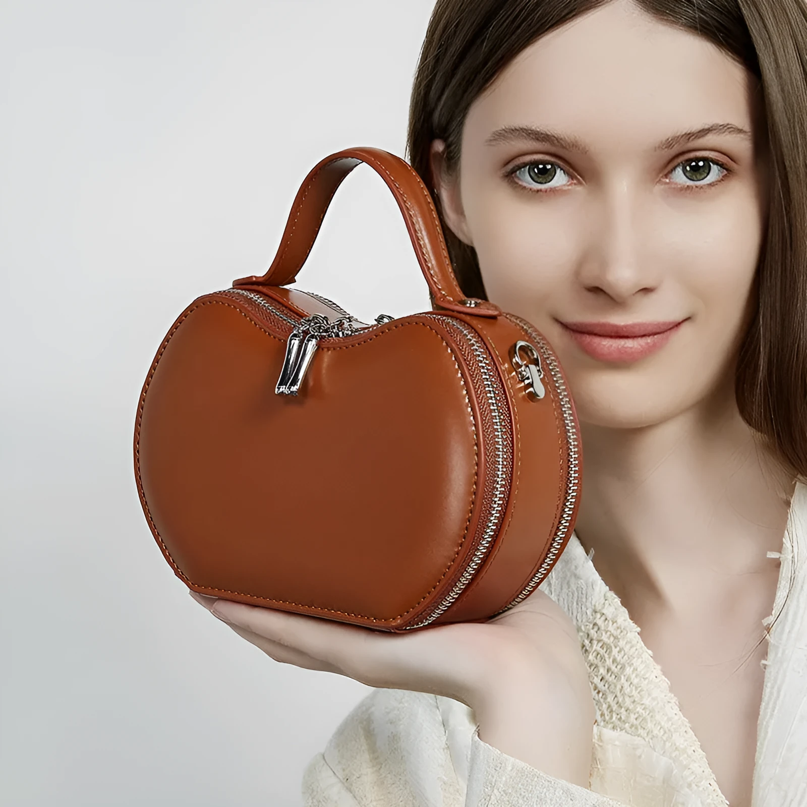 Creative fruit leather heart shape cowhide messenger bag in light brown with single shoulder strap