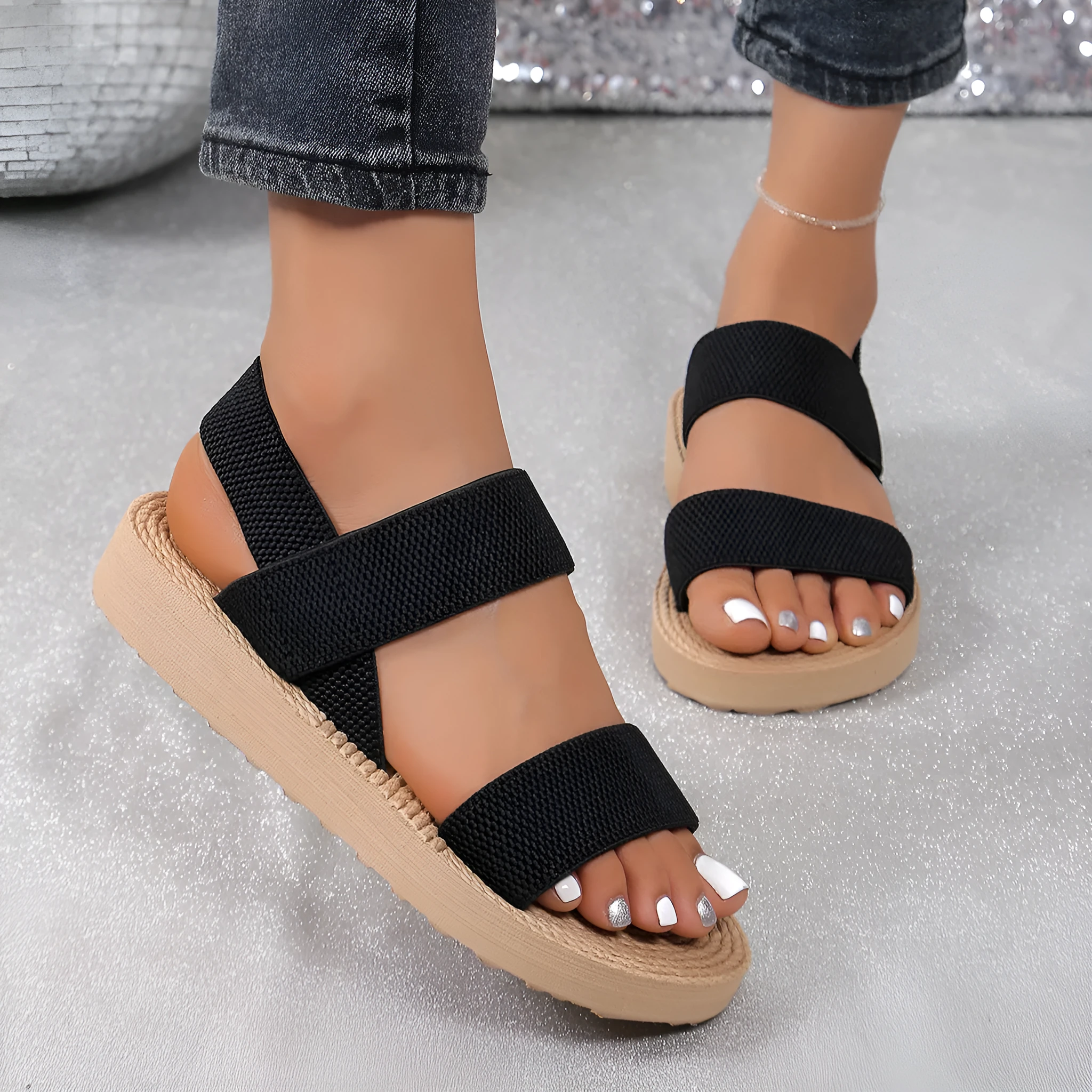 Women's flat wedge beach sandals with elastic band upper and EVA sole in median brown colour