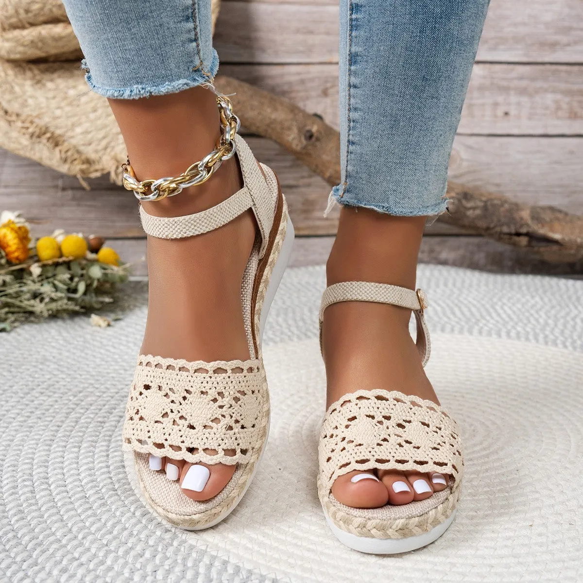 Beige closed toe wedge sandals with buckle fastening and leather upper for women
