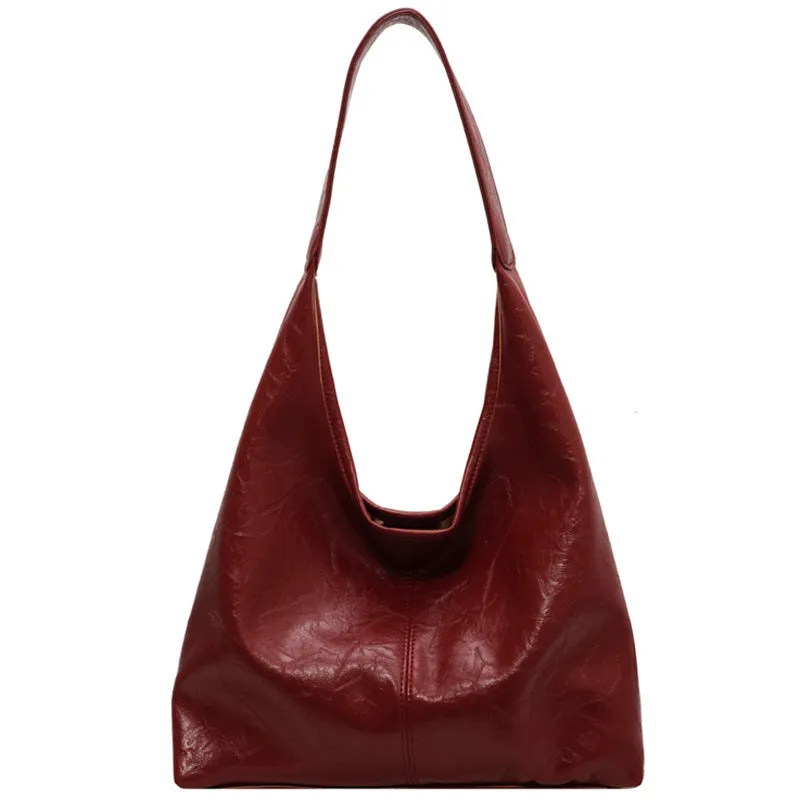 Soft leather shoulder bag with large capacity and sandwich pocket in street trend style