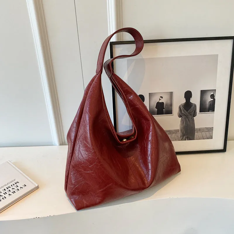 Soft leather shoulder bag with large capacity and sandwich pocket in street trend style