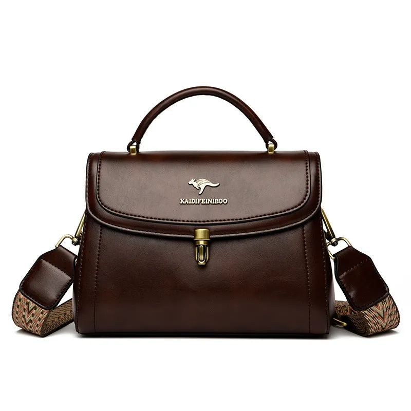 Women's textured PU crossbody handbag in black, 24x13x20cm, with sewing line detail and single shoulder strap