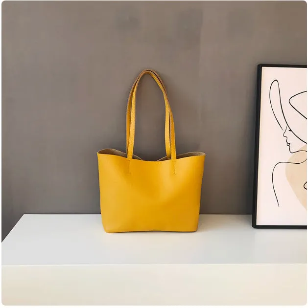 Lightweight medium cowhide leather tote bag for women with zip closure and double joint shoulder strap