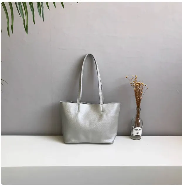 Lightweight medium cowhide leather tote bag for women with zip closure and double joint shoulder strap