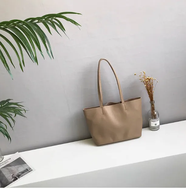 Lightweight medium cowhide leather tote bag for women with zip closure and double joint shoulder strap