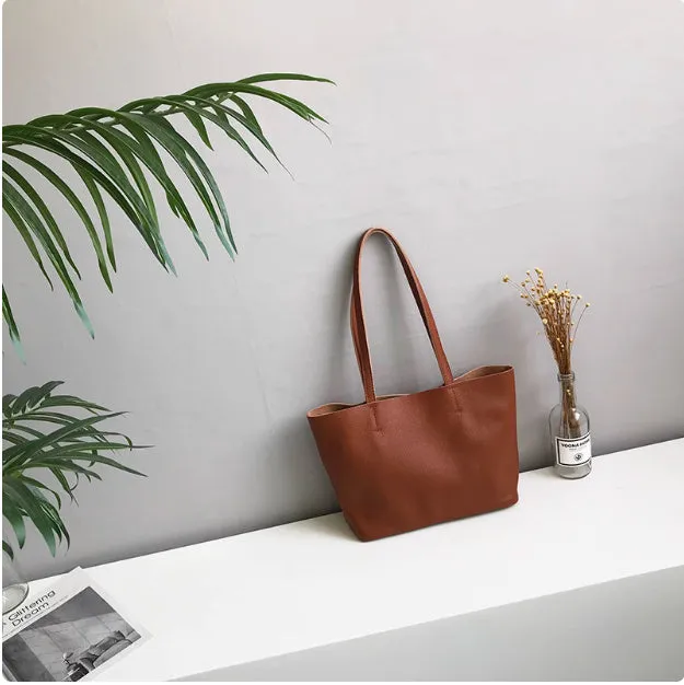 Lightweight medium cowhide leather tote bag for women with zip closure and double joint shoulder strap