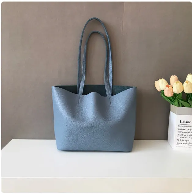 Lightweight medium cowhide leather tote bag for women with zip closure and double joint shoulder strap