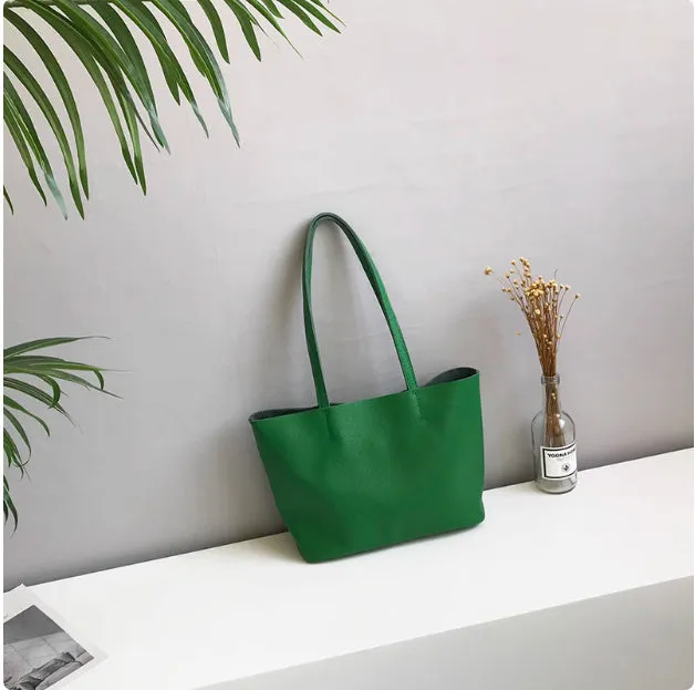 Lightweight medium cowhide leather tote bag for women with zip closure and double joint shoulder strap