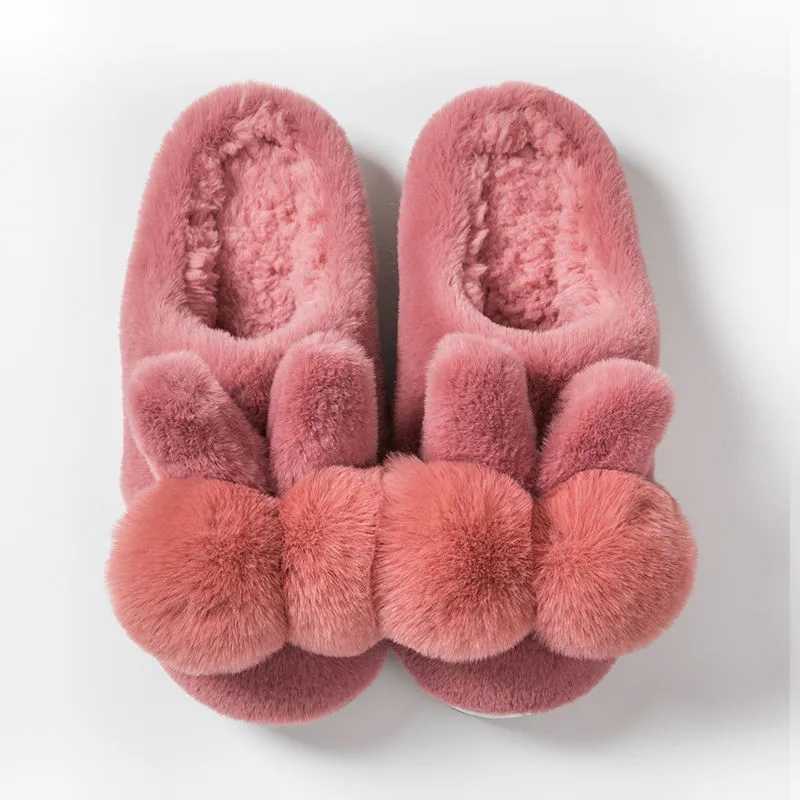 Women's fluffy rabbit fur slippers with floral pattern, high upper, and low heel in multiple colours.