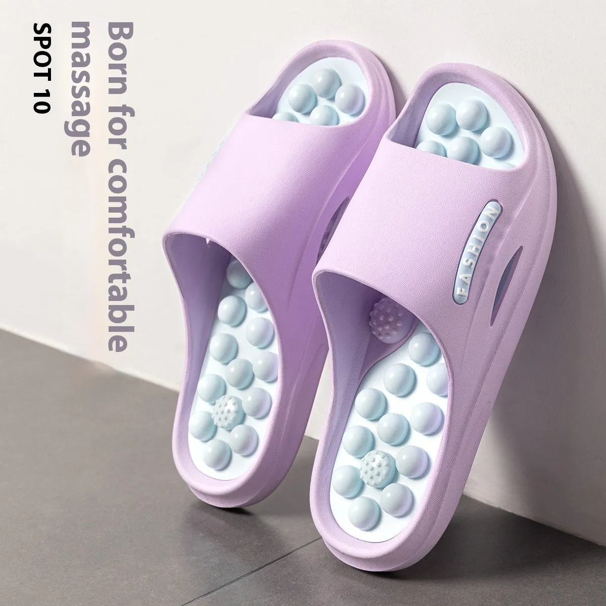 Ball massage sandals in purple, non-slip PVC with grape-particle studs, side view