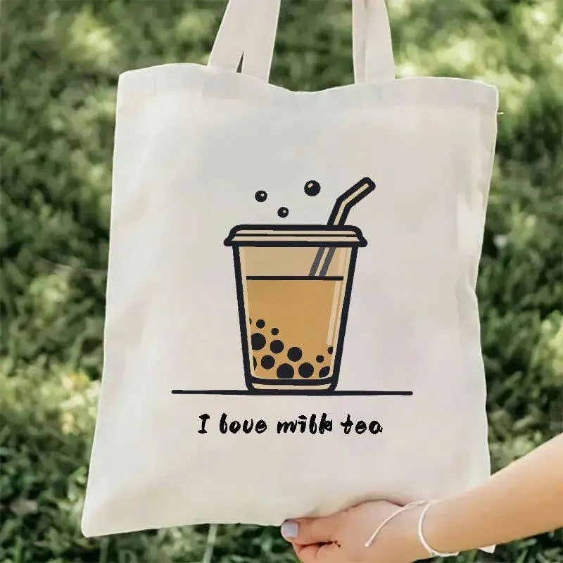 Women's canvas tote bag with printed letter pattern and chain detail in urban simplicity style